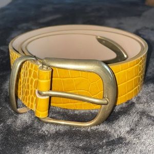Yellow and brass belt